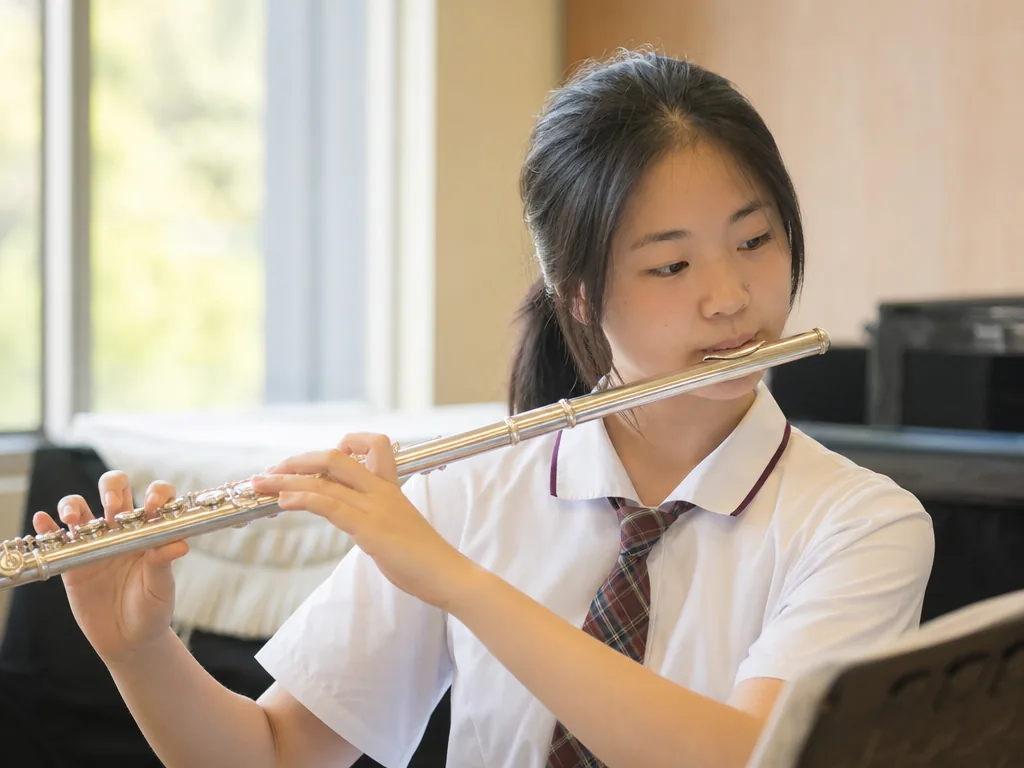 Flute: Complete Overview, History and Learning Guide 5 A flautist playing the flute